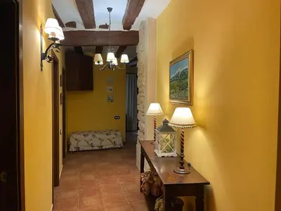 Una televisión o centro de entretenimiento en Casa Lidia - Antigua Posada Real