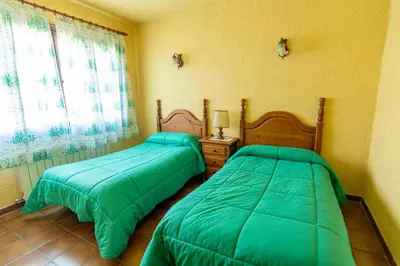 Cama o camas de una habitación en EVA & TRAVEL - El Bosquet de Prades