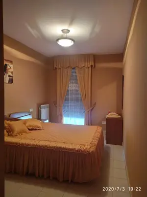 Cama o camas de una habitación en TU CASA EN MEQUINENZA CON WIFI