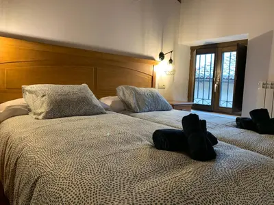 Cama o camas de una habitación en Atico Jaca Centro