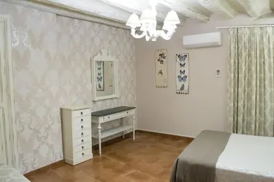 Cama o camas de una habitación en Apartamenticos Plaza Las Armas II