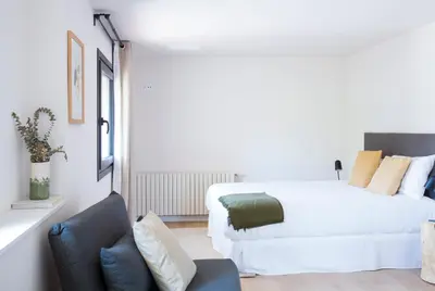 Cama o camas de una habitación en Hotel Rural Mas de l'Illa