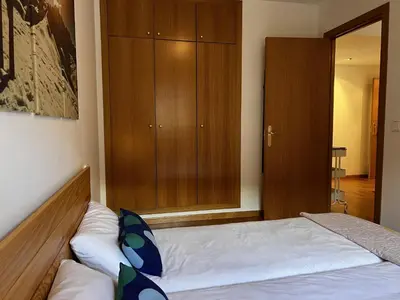 Cama o camas de una habitación en Escarra - Reformado, acogedor y luminoso, con garaje cubierto y ascensor BY PIRINEOS 360