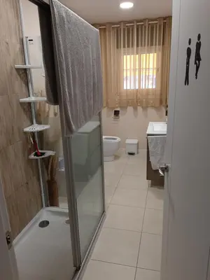 Un baño de Habitacion doble en casa compartida con anfitriones