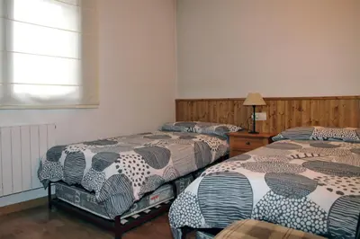 Cama o camas de una habitación en Vielha centrico Calbeto FU