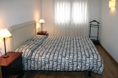 Cama o camas de una habitación en Vielha centrico Calbeto FU