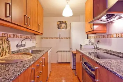 Una cocina o zona de cocina en Junto a Vielha Apartamento Gausac
