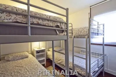 Cama o camas de una habitación en Junto a Vielha Apartamento Gausac