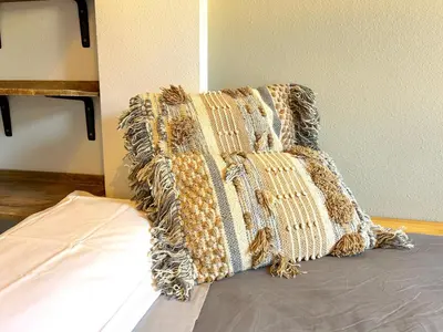 Cama o camas de una habitación en Apartament encantador, familiar i lluminós by RURAL D'ÀNEU