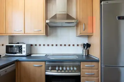 Una cocina o zona de cocina en Apartamento Las Margas Golf Pirineo Aragones