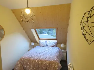 Cama o camas de una habitación en Ático Dúplex reformado con vistas a la montaña
