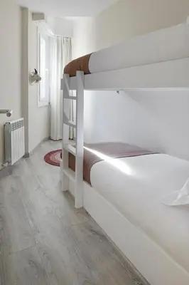 Cama o camas de una habitación en Marcatosa by FeelFree Rentals