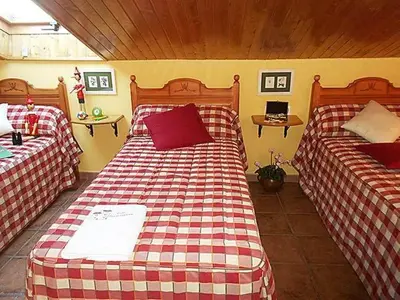 Cama o camas de una habitación en Apartamentos Turismo Rural Casa Santorroman
