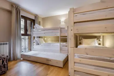 Cama o camas de una habitación en Musales, apartamento familiar en Panticosa