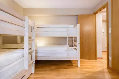 Cama o camas de una habitación en Musales, apartamento familiar en Panticosa