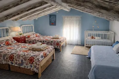 Cama o camas de una habitación en Casa rural 