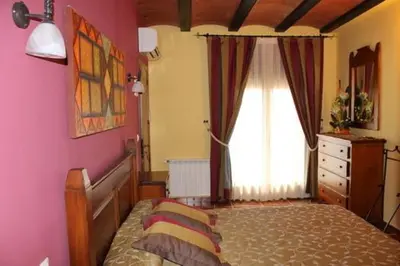 Cama o camas de una habitación en El Corral de Valero