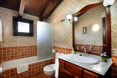 Un baño de Apartamentos Teresana