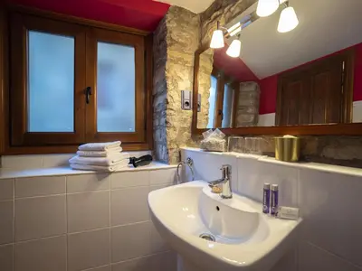 Un baño de CASA CRUZ - auto check-in