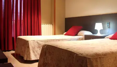 Cama o camas de una habitación en Hostal Cafeteteria Goya
