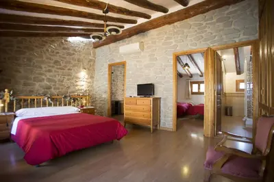 Cama o camas de una habitación en Casa rural la Posada ,Terra Alta, Matarraña.