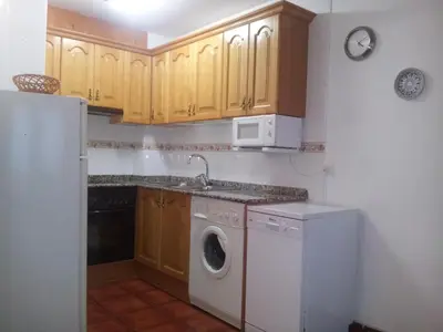 Una cocina o zona de cocina en Apartamentos Petronilla