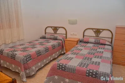 Cama o camas de una habitación en Apartments Ca la Victoria
