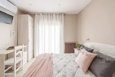 Cama o camas de una habitación en Hostal Buenos Aires