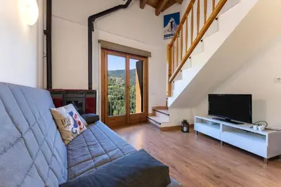 Una televisión o centro de entretenimiento en Apartamentsaloriaburg