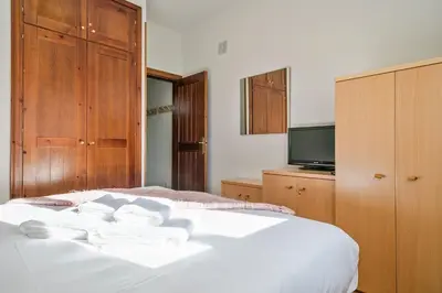 Cama o camas de una habitación en Luderna - Apartamento Tanau A1 Esquirós