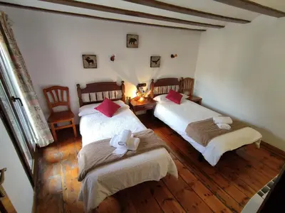 Cama o camas de una habitación en Casa de la Marmota