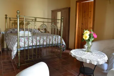 Cama o camas de una habitación en Casa Rural FuenteVieja
