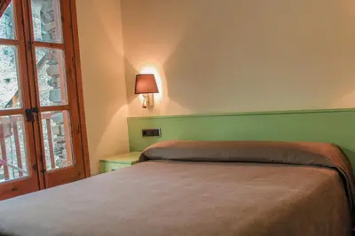 Cama o camas de una habitación en Hotel Saloria