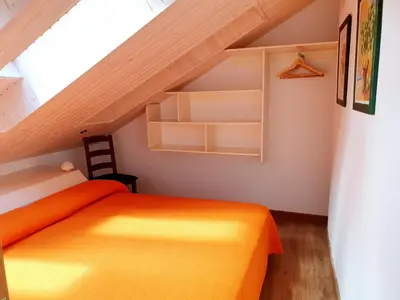 Cama o camas de una habitación en Apartamentos Casa Patro