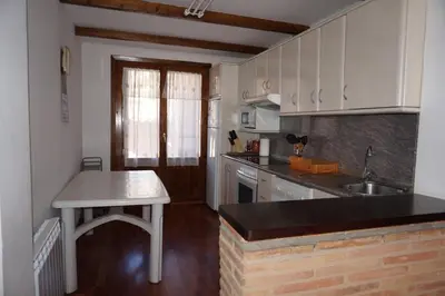 Una cocina o zona de cocina en Casa Rural Os Arregueses
