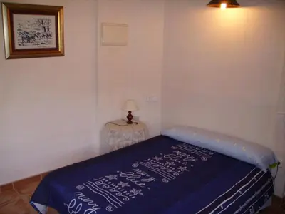 Cama o camas de una habitación en Ca les Barberes