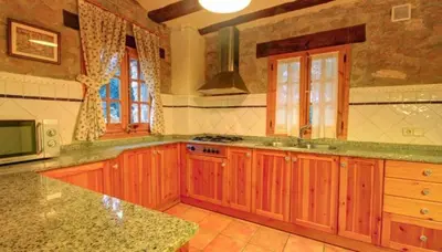 Una cocina o zona de cocina en Mas Del Cigarrer Allotjament Rural