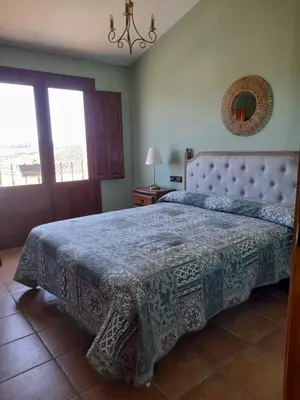 Cama o camas de una habitación en Els Canterers