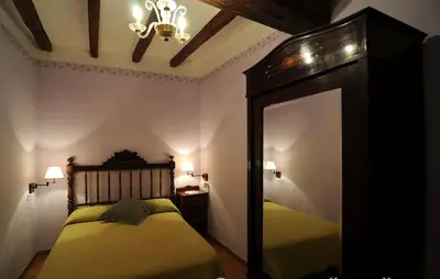 Cama o camas de una habitación en Casa Estivill