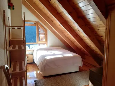 Cama o camas de una habitación en Apartament Ca de Gallisca Taüll Vistas Espectaculares