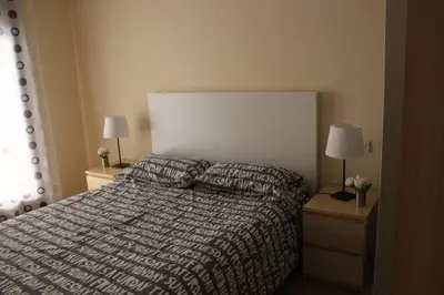 Cama o camas de una habitación en Amplio apartamento Plaza de Toros