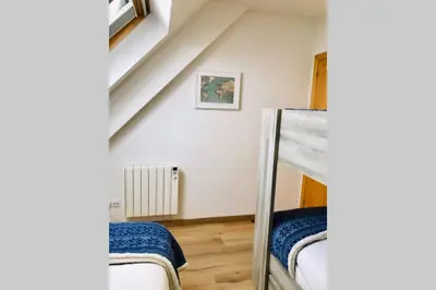 Zona de estar de Ático en el Pirineo Aragonés Panticosa