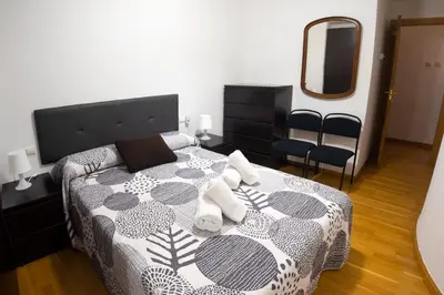 Cama o camas de una habitación en Piso en c/ Casta Álvarez