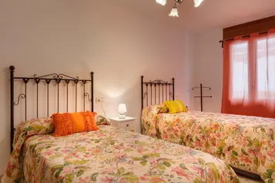 Cama o camas de una habitación en APARTAMENTO CASA PALOMA
