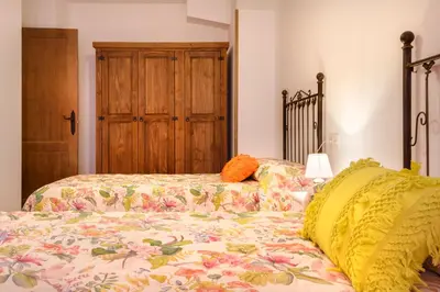 Cama o camas de una habitación en APARTAMENTO CASA PALOMA