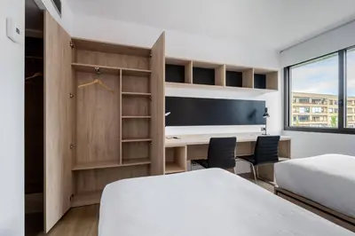 Cama o camas de una habitación en Micampus Pamplona Student Residence