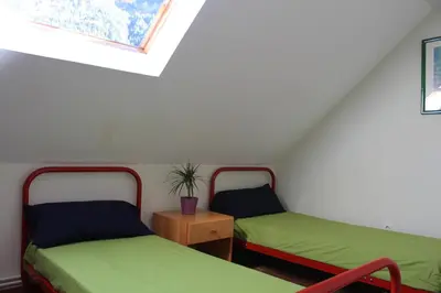 Cama o camas de una habitación en Albergue de Canfranc Estación