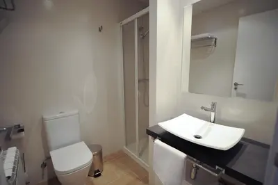 Un baño de Apartamentos Turísticos Mirablanc