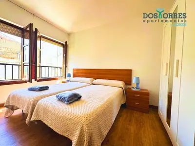 Cama o camas de una habitación en Dos Torres Hobbiton- En el Corazón del Casco Histórico