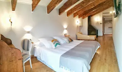 Cama o camas de una habitación en Hotel Boutique La Casa del Río